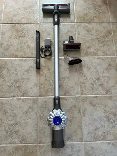 The Dyson V6 specs include a digital motor (up to 110,000 rpm), up to 100 Air Watts of suction, stan...