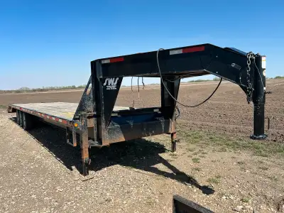2015 SWS 36’ gooseneck trailer w/ winch and upper tool box. Flip up rear center. Used very little. P...