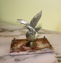 Eagle and Earth desk centerpiece in brass, onyx stone base