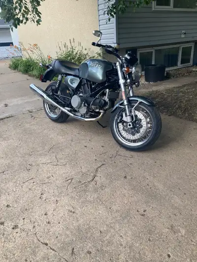 Very clean bike, low kms. I never ride it. Have Ducati quick detach leather bags (locking) and mount...