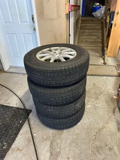 These Blizzak tires have only one season on them. They have been stored indoors since 2015. The rubb...
