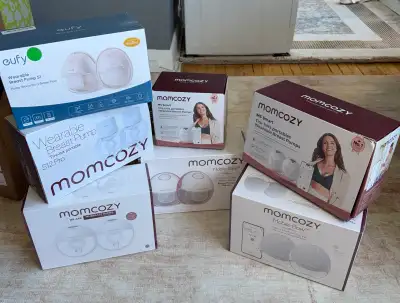 These wearable breast pumps are brand new in their original factory-sealed boxes, offering ultimate...
