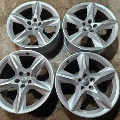 selling four 19 inch Audi OEM alloy rims for $900. rims have no curb rash, no bend or crack. bolt pa...