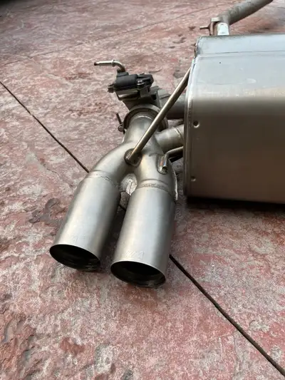 Full M performance Exhaust with titanium tips. Muffler had a crack and was repaired but cracked agai...