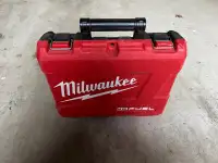 Milwaukee case and battery charger with free bag of nuts/bolts