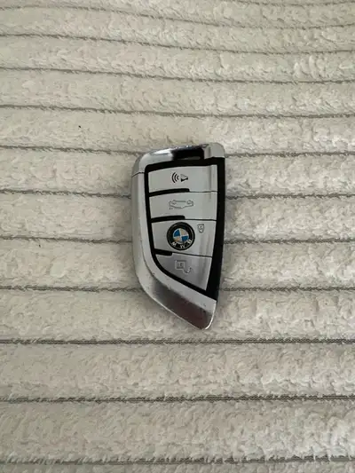 BMW key fob can be re programmed to work on any BMW for a lot less cost than buying a new fob. This...