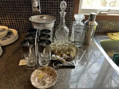 Glassware, decanter, cocktail shaker, ice bucket, stir sticks, jigger, strainer, bottle opener See i...