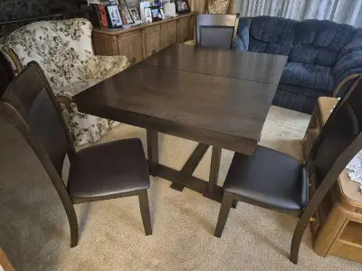Wooden table and four chairs, View more
