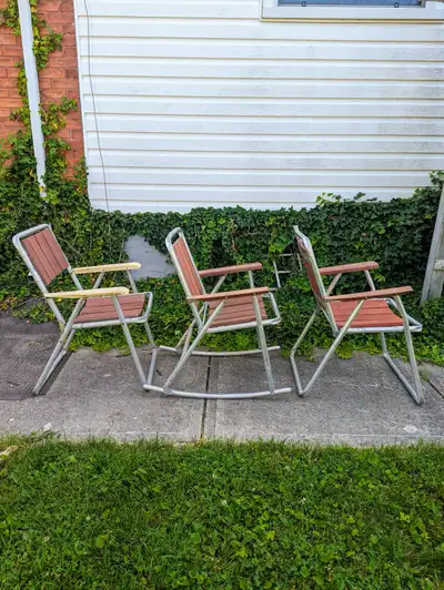 Very good vintage retro cedar lawn chairs for sale. $40 each, the rocker is $80. Buy all 3 for total...