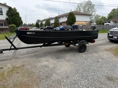 20 ho motor runs good, re-wired with nav lights and auto bilge, cracked hull but stiffener plate and...