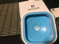 Pet dish with floating tray so it keeps your pet dry