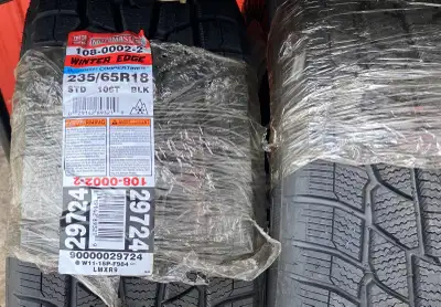 FOR SALE —2– NEW WINTER TIRES 235-65R18 . ( FREE INSTALL + BALL., ON THE WHEELS ONLY ! )