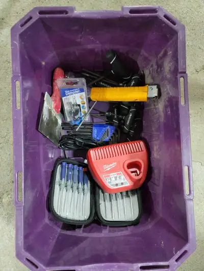 Purple bin with tools, View more