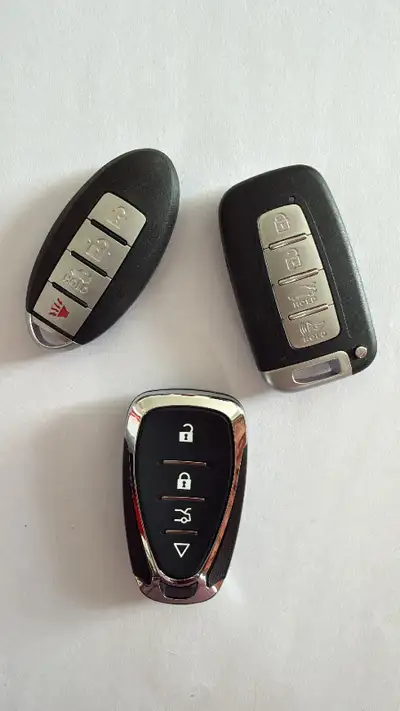Mobile automotive locksmith offering: -key programming -key blade cut -all keys lost -duplicate -tra...