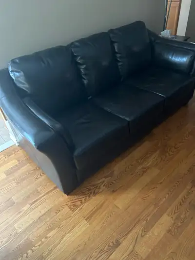 Black leather couch, View more