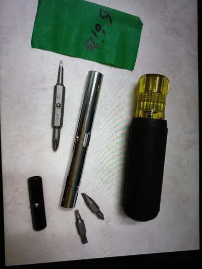 This is a new Klein Tools multi-bit screwdriver with 6 different bits included for various screw typ...