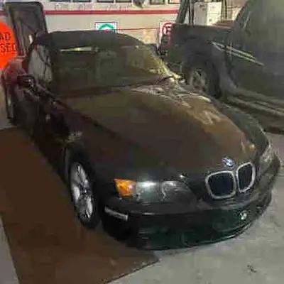 2000 BMW Z3 convertible right hand drive . This all black beauty has the 2.8 L with BDL suspension....