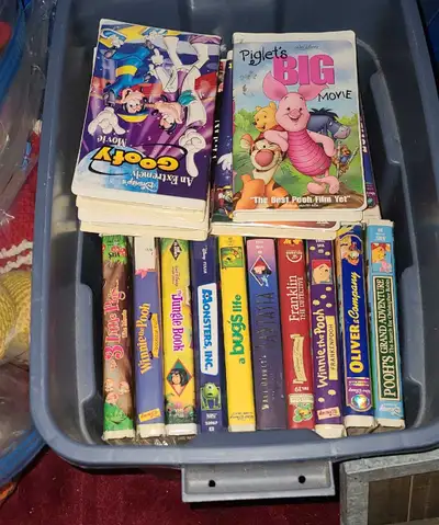 tote of kids' VHS tapes movies 90s, View more