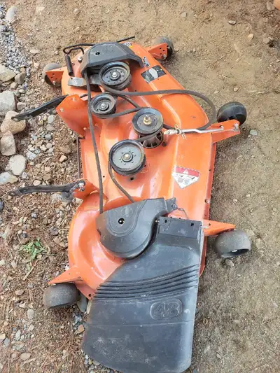 This is a Husqvarna 48" mower deck. It's in used condition and ready to get your lawn looking great....