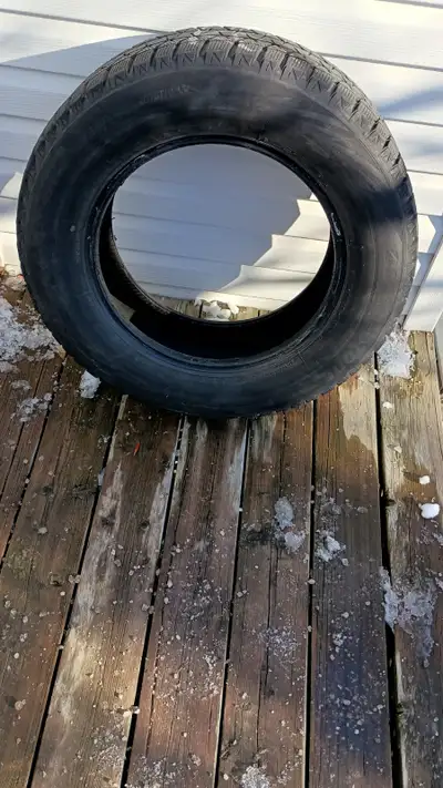 SET OF 4 BRIDGESTONE BLIZZAK 235/65R17 WINTER TIRES 6mm OF TREAD remaining IN EXCELLENT CONDITION