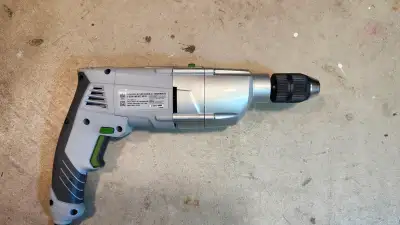 1/2 " Haussmann Drill - 120-volt, 8 Amp plug-in. Heavy duty hand held. 2 gear impact Drill