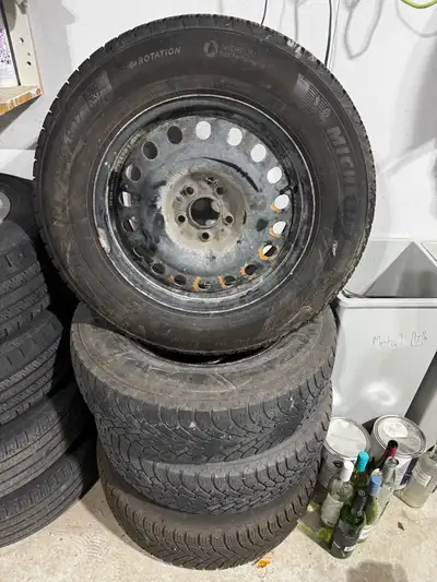About 5 years old. Rims are 17x7.0. Bolt pattern is 5-114.3mm. There are two different type of tires...