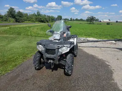 2017 Polaris Sportsman Touring EPS SP. Bike will come with a Polaris plow and mount. Has a Polaris 3...