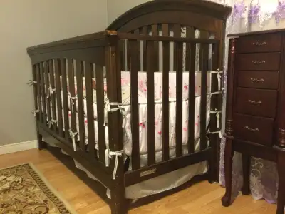 brown wooden crib, View more