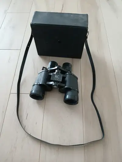 Vintage Bushnell Insta-Focus zoom binoculars, model 7-15x35., View more