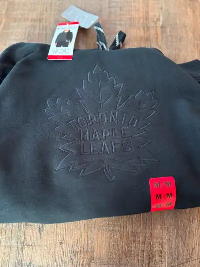 Toronto Maple Leafs sweater Hoodie New Medium size all black with NHL logo Whitby pick up Manning &...
