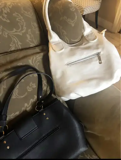 Two  new purse $50 for both locations west end, View more