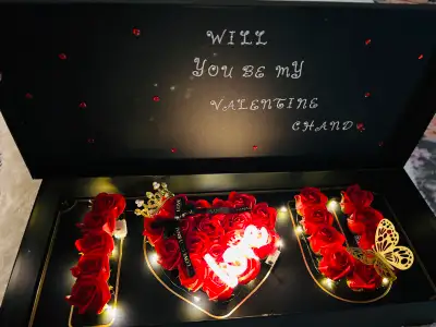 This stunning 'I Love You' rose box is the perfect romantic gesture. Featuring elegant artificial ro...