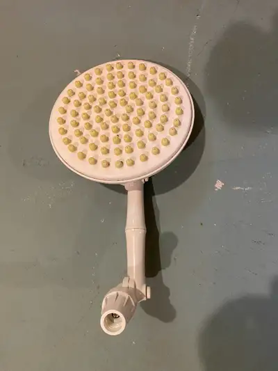 Used 8-inch round plastic showerhead for sale, ask for $25. It is used, but is in very good shape.
