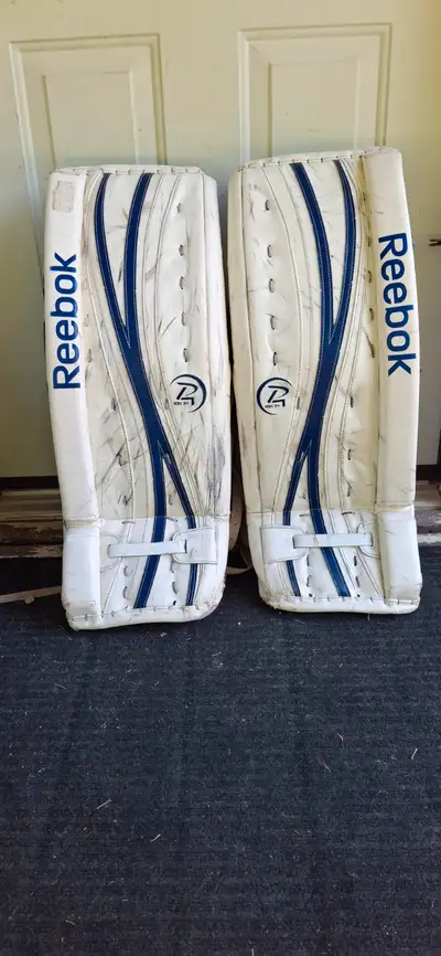 29+1 REEBOK Goalie pads. All straps and velcro in good working condition. Still good for on ice.I bo...