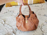 Authentic Louis Vuitton Congac Mahina L leather  Bag
