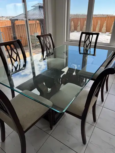 glass table + 6 chairs , View more