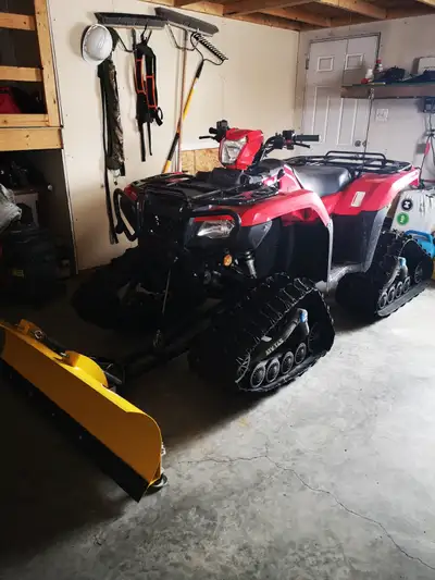 Can sell with tracks or just with tires, with plow or without. Like new. Garage kept. 1 owner. Heate...