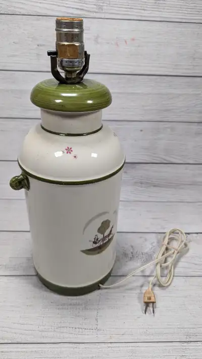 No cracks. Was at our cottage. We've since changed the lamps. From the 1970's. Great condition. Pick...