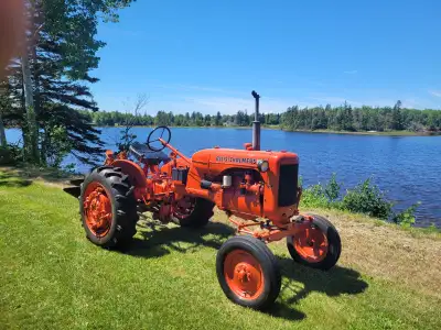 1955 Allis Chalmers CA with snap coupler plow. Restored. Call 902-888-7246.