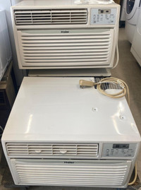 Several Haier 10,000 BTU Wall Air Conditioners