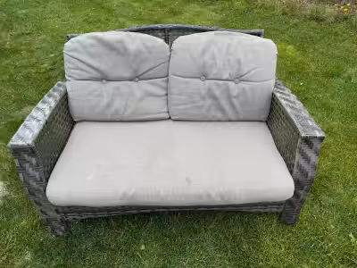 Patio furniture set. 1 Couch, 1 table and 2 Chairs. They are all in great condition except for 1 cha...