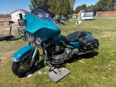 Great bike very clean, upgraded stereo JBC 4 -6.5 speakers S&S cams S&S lifters k&N filter True dual...