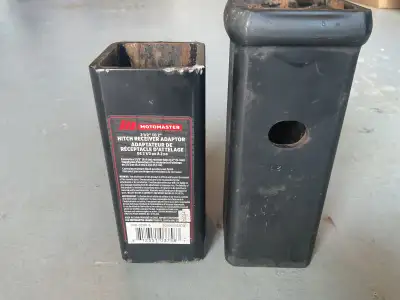 Two Trailer hitch reducers. Reduces hitch size from two and one-half to two. Both for $25.
