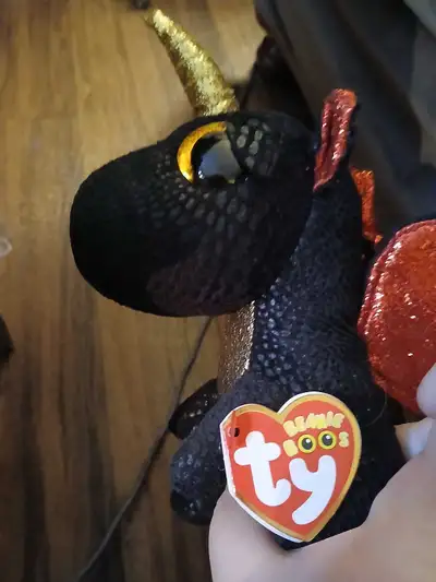 This is a used Ty Beanie Boo, a cute and collectible plush toy with big, adorable eyes and soft, hug...