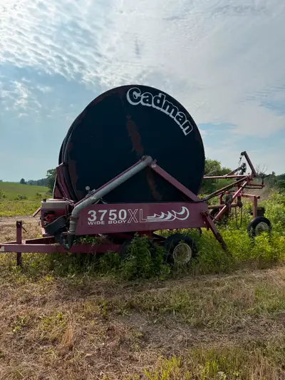 Cadman 3750 reel and traveller. Honda motor, new komet gun. Capari pump. Heavy double reach wagon on...