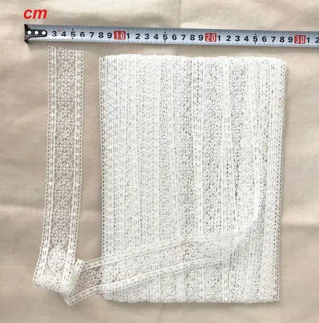 Clearance Sale: 1.6” Wide x 18 Yds White Trim with Stains