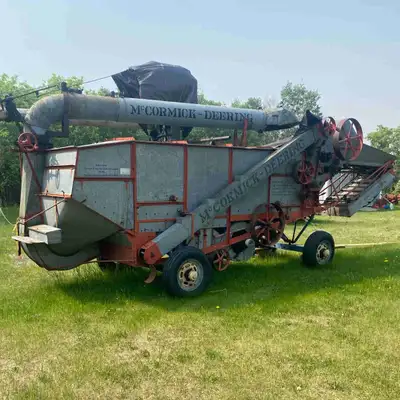 28” Threshing machine in good working condition. Comes with all belts and two drive belts. Wheels on...