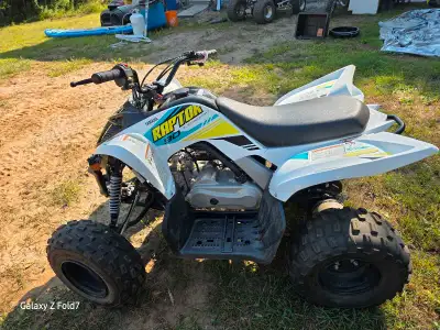 I'm selling a Yamaha Raptor 90, perfect for young riders! This four-stroke engine ATV is in excellen...