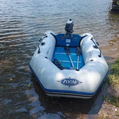 Older Zodiac and Motor for sale. Yamaha 3 H.P. 2 stroke..runs good. Zodiac has Hard Floor that Remov...
