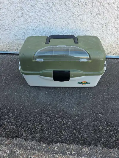 I'm selling a used Plano fishing tackle box, fully stocked with lures, weights, line, and various ta...